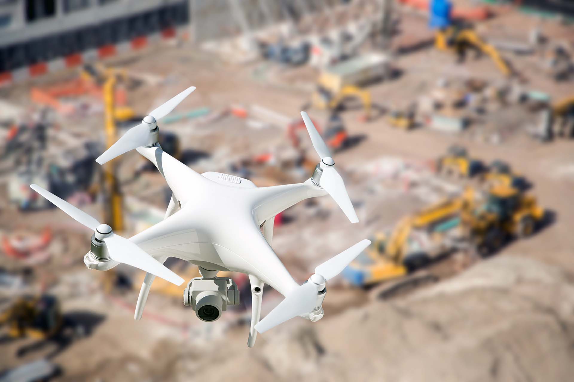 Drone flying above construction site