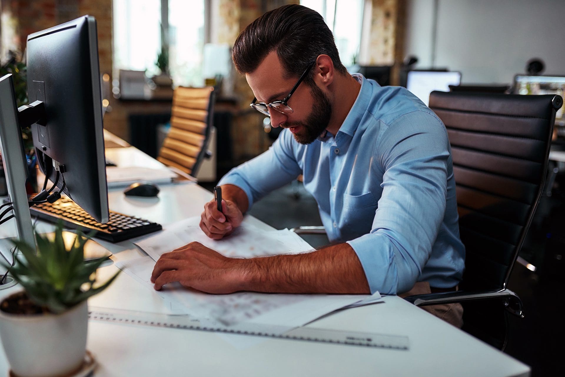 Man working on construction plans