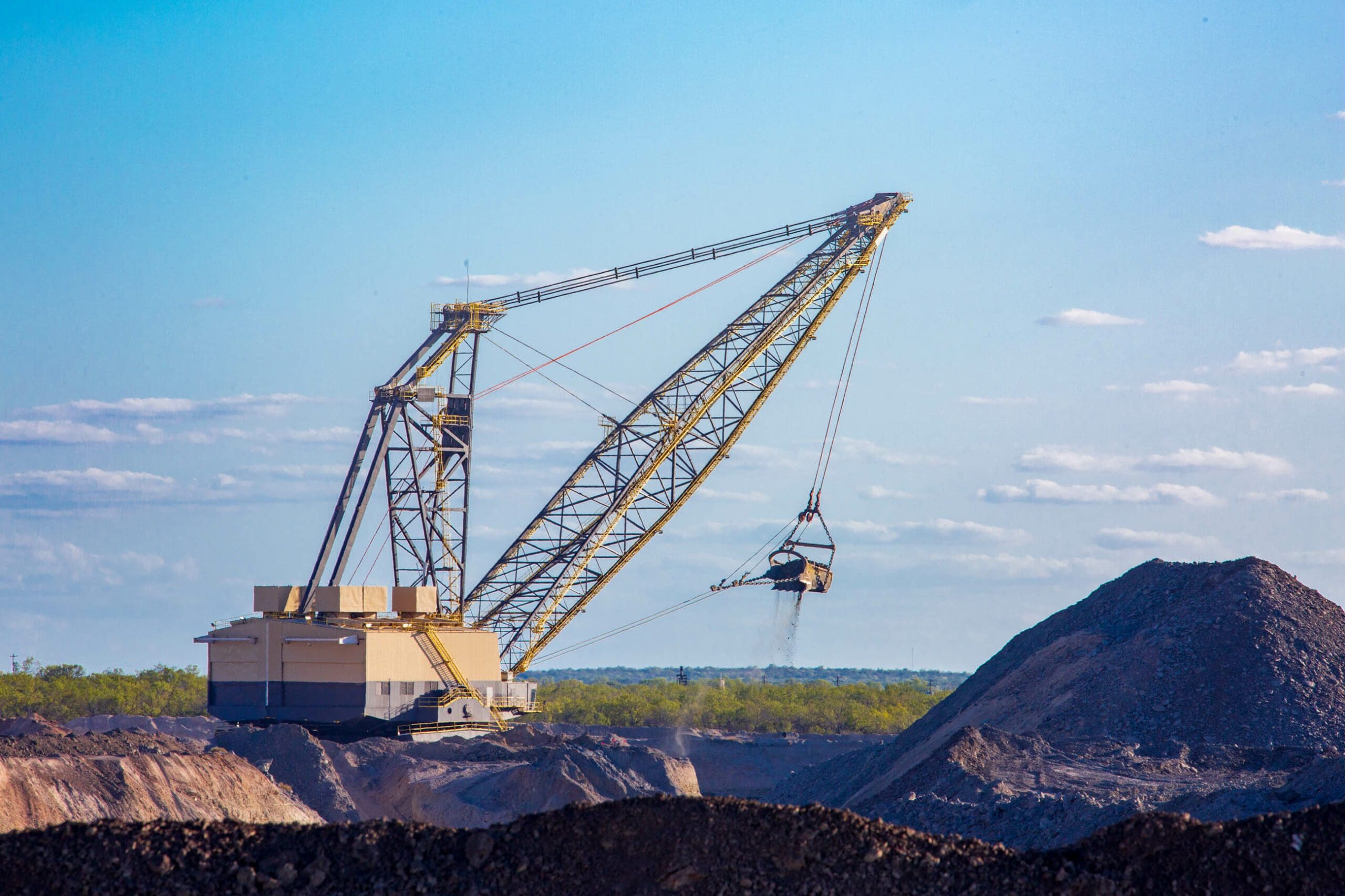 Excavator operating at a mine