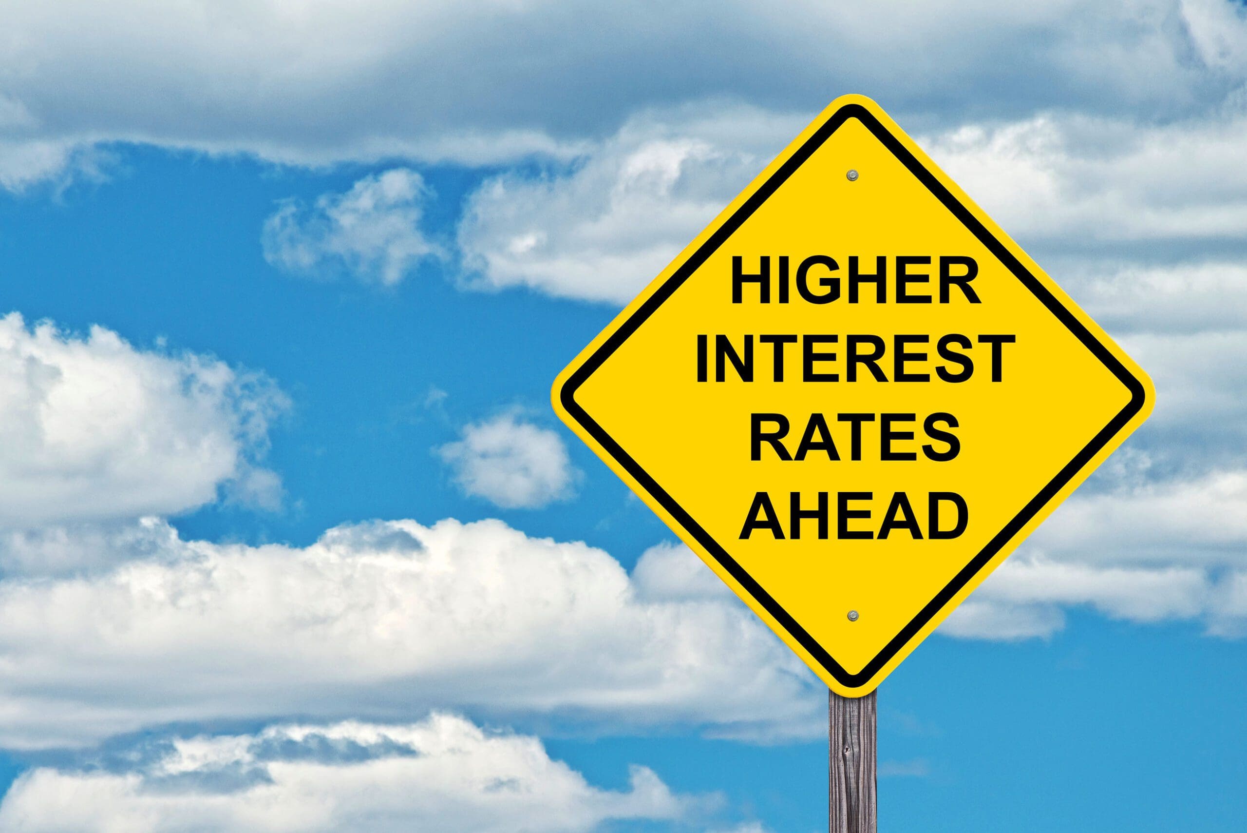 Sign post saying, "Higher Interest Rates Ahead"