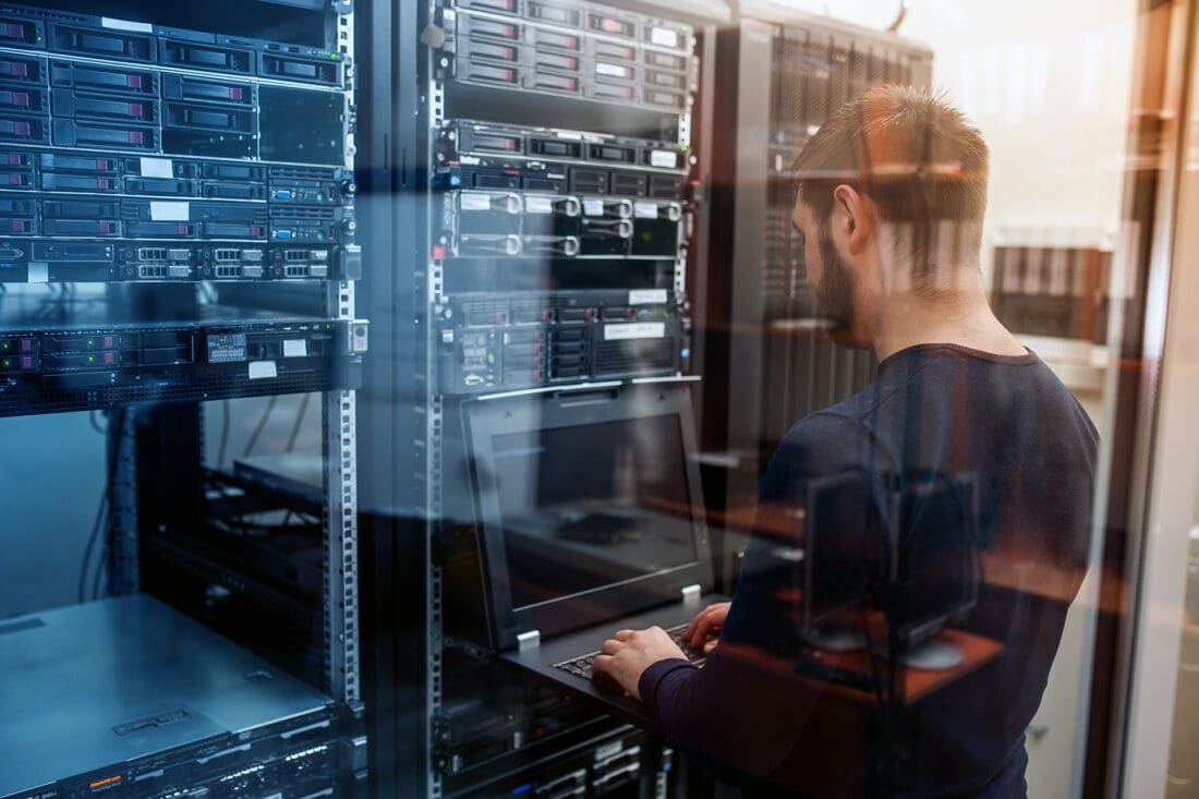 Man working at a data center